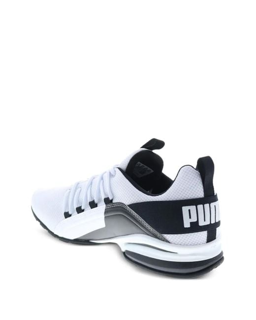Sneakers Axelion Break di PUMA in White da Uomo