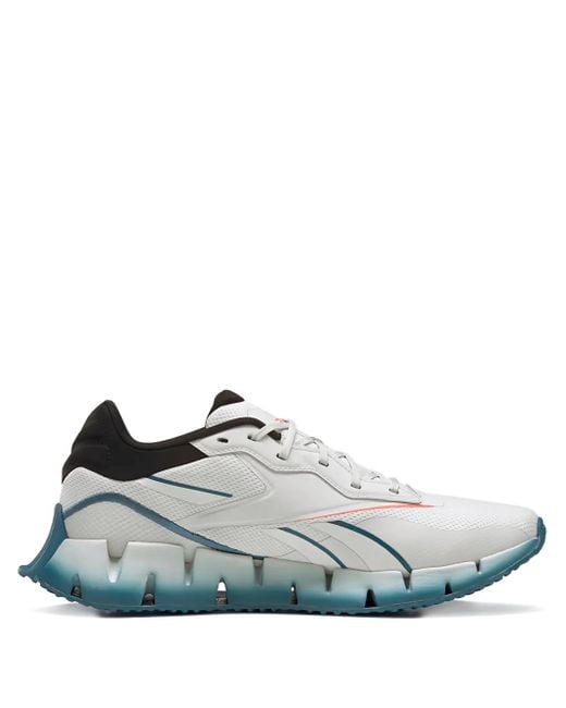 Reebok Zig Dynamica 4 Pure Grey Orange Flared Sneakers in White für Herren