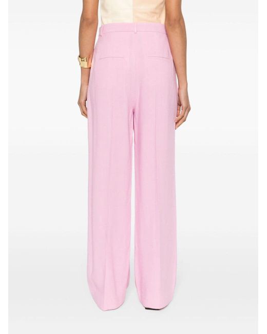 Pantalon ample Zoelle à taille haute Nanushka en coloris Pink