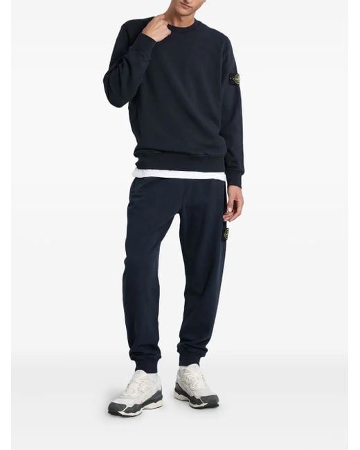 Stone Island Blue Cuffed Logo-Patch Tack Pants for men