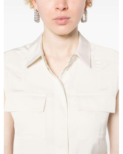 Camisa sin mangas con cuello de pico Calvin Klein de color White