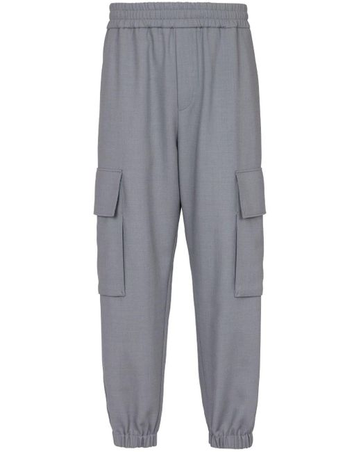 Pantalon fuselé à poches cargo Balmain pour homme en coloris Gray