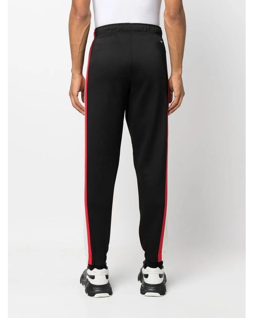 DIESEL Black Logo-Patch Tapered Track Pants for men