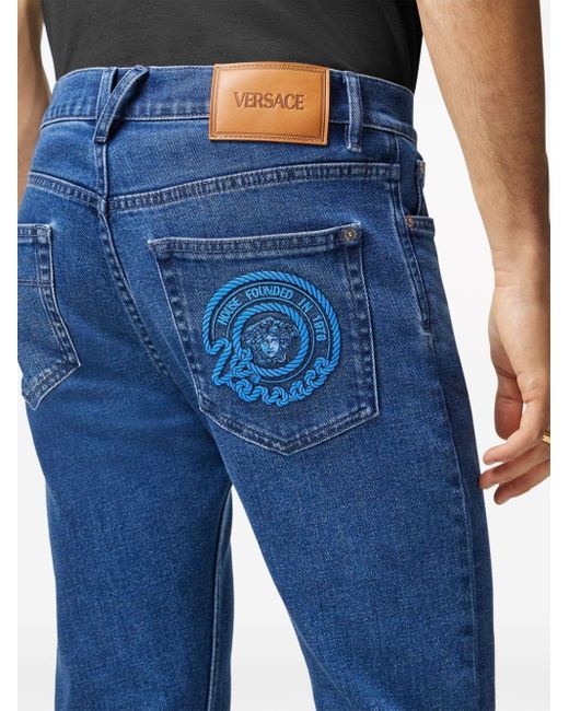 Versace Blue Medusa-embroidered Slim-cut Jeans for men