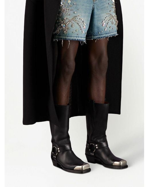 Botas con detalle de arnés Gucci de hombre de color Black