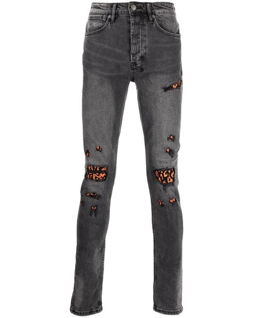 Vaqueros skinny con detalles rasgados Ksubi de hombre de color Gray