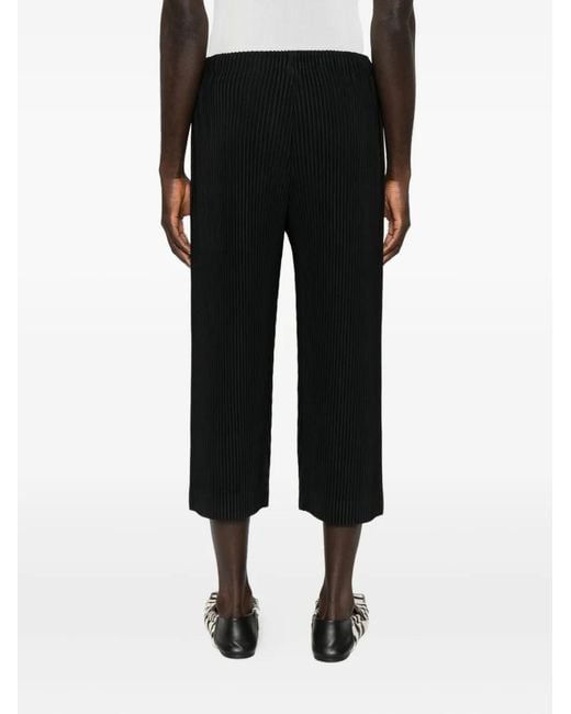Homme Plissé Issey Miyake Black Cropped Pleated Joggers With Relaxed Fit for men