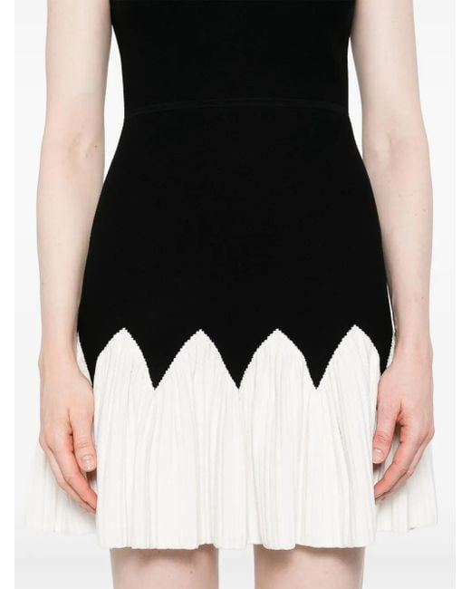 Vestido corto de punto Sandro de color Black