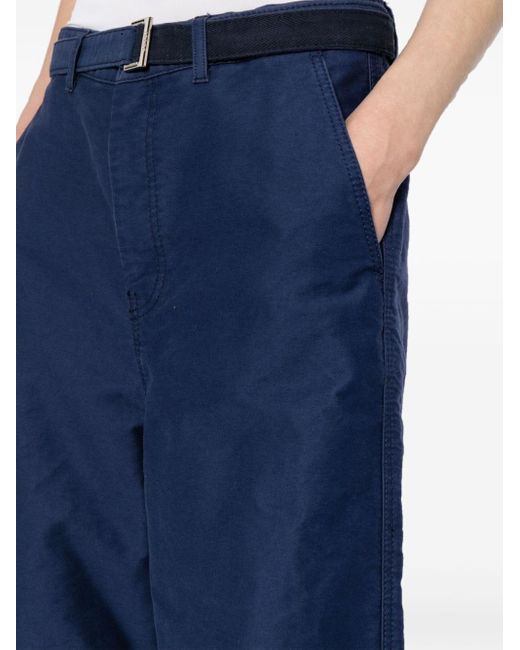 Pantalones anchos con cinturón Sacai de hombre de color Blue