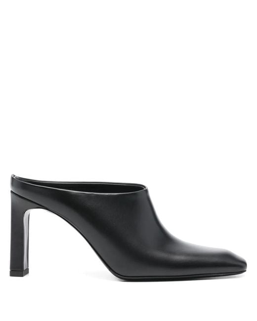 Mules con tacón de 85 mm Totême  de color Black
