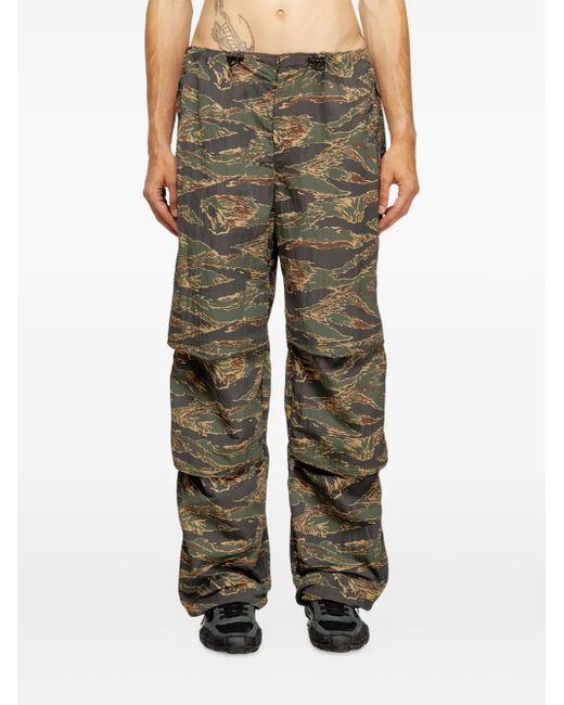 DIESEL Green Graphic-Print Trousers for men