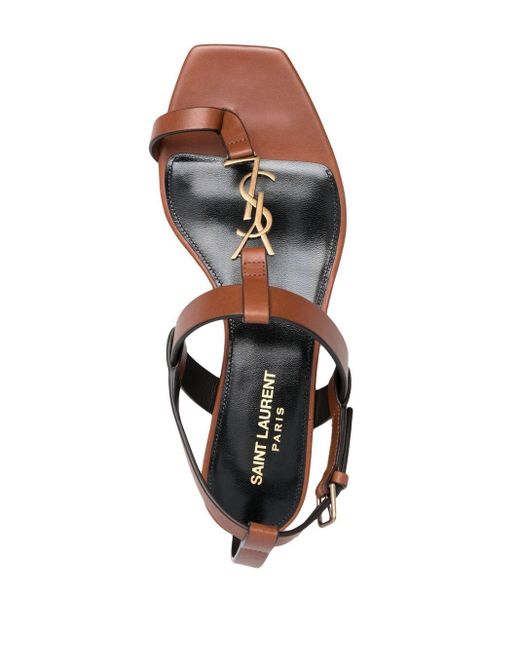Sandalias planas Cassandra con monograma YSL Saint Laurent de Cuero de  color Marrón | Lyst