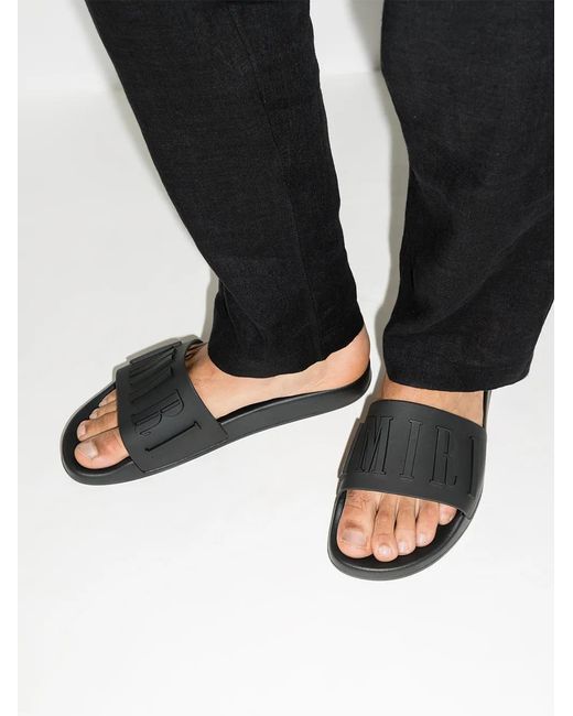 Amiri Black Brand-embossed Rubber Sliders for men