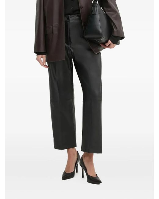 Pantalones de piel artificial Sandro Ferrone de color Black