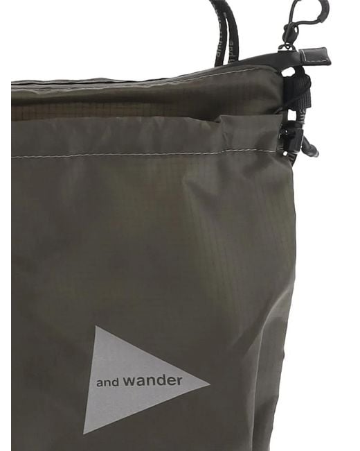 And Wander Black Drawstring Backpack