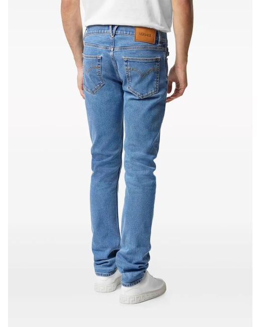 Versace Blue Medusa Head-Embellished Mid-Rise Slim-Fit Jeans for men