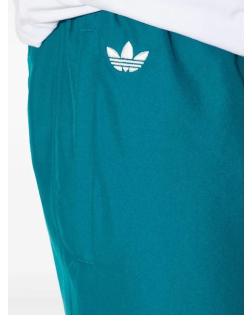 Pantalones de chándal con tres rayas Adidas de hombre de color Blue