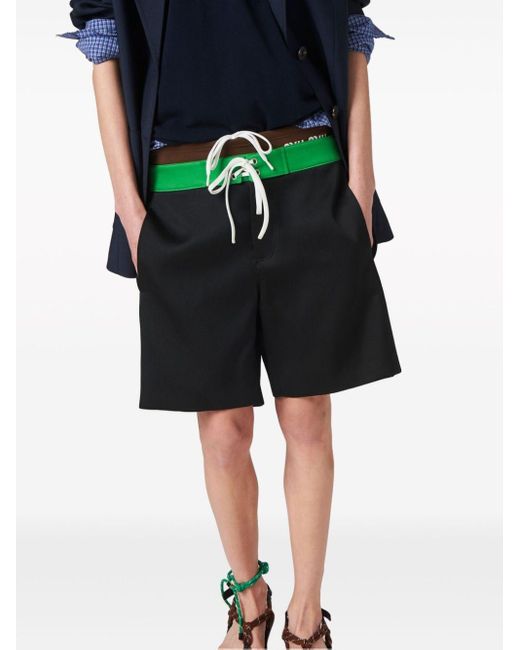 Pantalones cortos con cordones Miu Miu de color Green