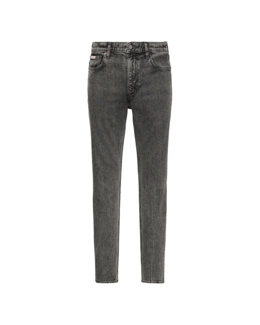 Calvin Klein Gray Logo-Patch Acid-Wash Jeans for men