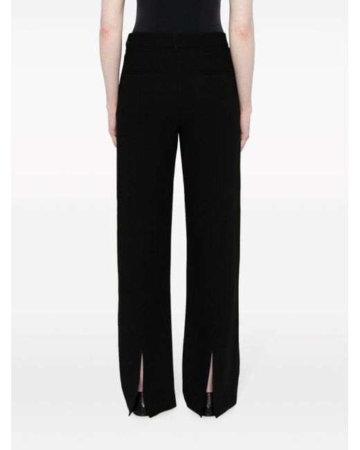 Pantalon droit à plis marqués Totême  en coloris Black