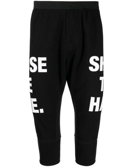 Nils Black Slogan-Print Drop-Crotch Shorts for men