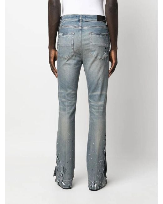 Amiri Blue Paint-splattered Flared-leg Stretch-denim Jeans for men