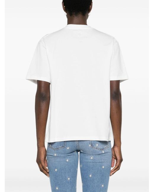 Camiseta con mariposa de apliques Maje de color White