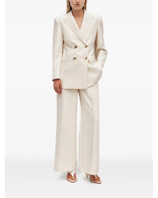 Aje. Natural Vortex Pressed-Crease Trousers