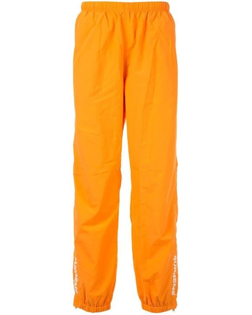 Supreme Orange Warm Up Track Pants for men