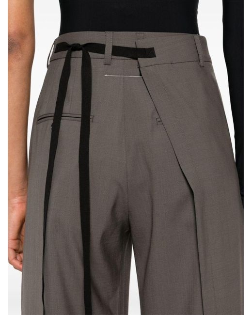 Pantalones con diseño cruzado MM6 by Maison Martin Margiela de color Gray