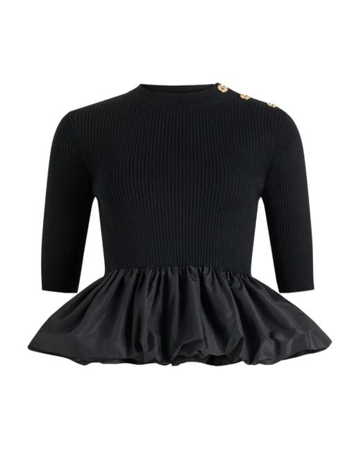 Patou Black Ribbed Peplum Top