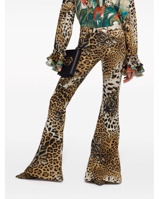 Pantalones acampanados con estampado de leopardo Roberto Cavalli de color Metallic
