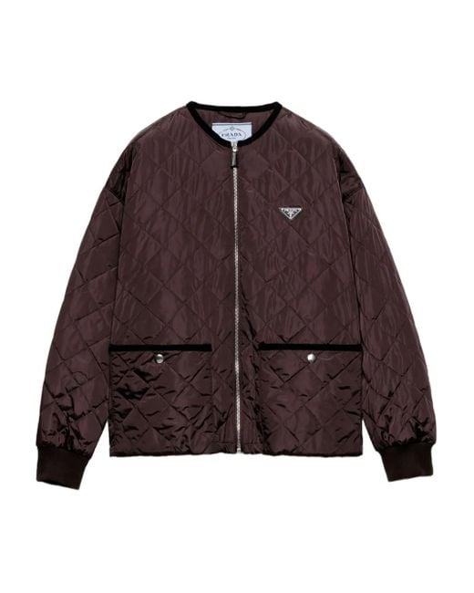 Plumífero con logo triangular Prada de color Brown