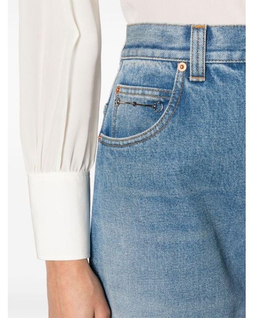 Jeans a gamba ampia con morsetto di Gucci in Blue