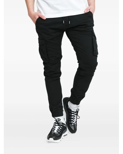 メンズ Alpha Industries トラックパンツ Black