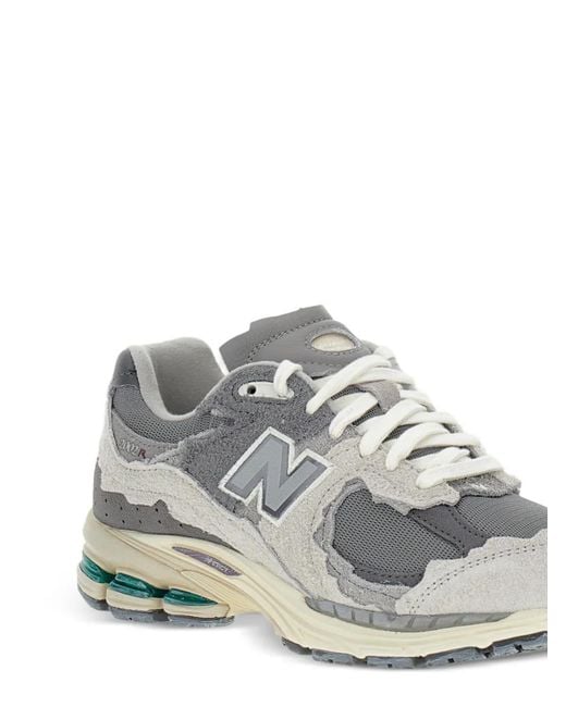 New Balance White 2002R Protection Pack Logo-Detail Sneakers