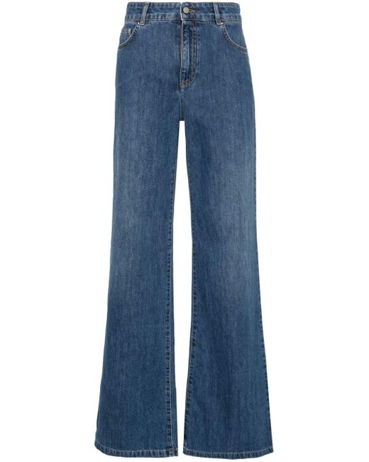 Jeans dritti a vita media di Moschino in Blue