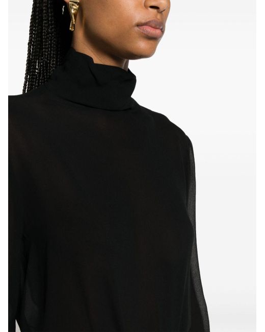 Blusa semi trasparente con collo alto di Pinko in Black