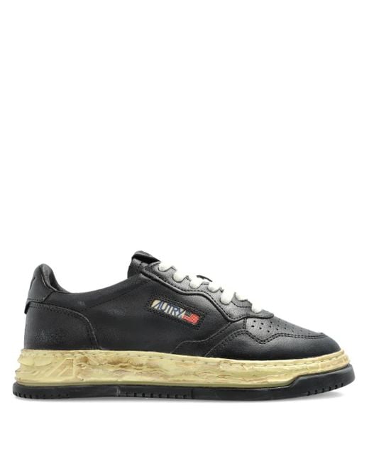 Autry Black Leather Distressed-Sole Sneakers