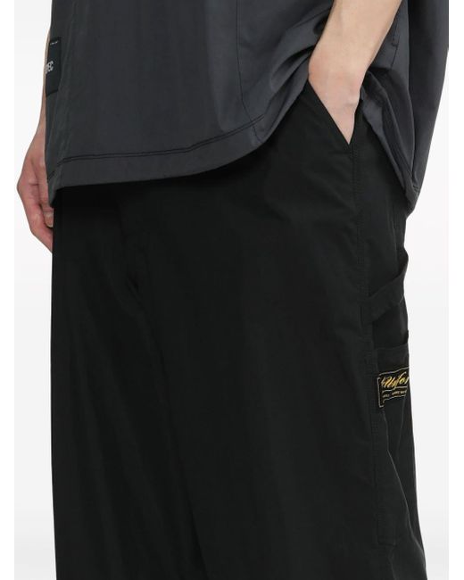 Izzue Black Logo-appliqué Loose-fit Trousers for men