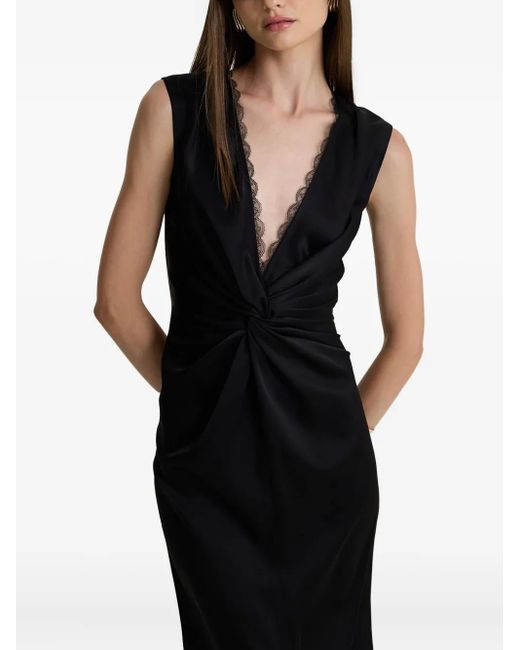Robe Elegance À Col Torsadé MOOS STUDIO en coloris Black