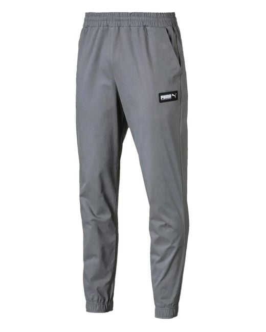 メンズ PUMA Fusion Woven Track Pants Gray