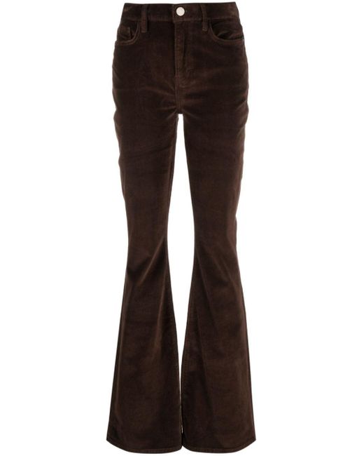 Pantalon en velours à coupe évasée FRAME en coloris Brown