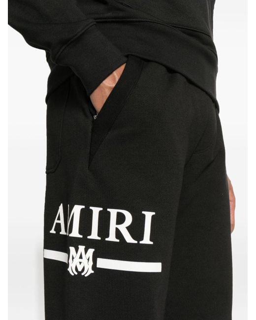 Pantalon de jogging ample à logo imprimé Amiri pour homme en coloris Black