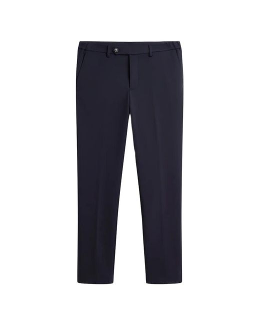 Tommy Hilfiger Blue Logo-Plaque Slim-Fit Trousers for men