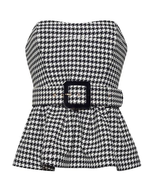 Top Tilda con peplum Cara Cara de color Black