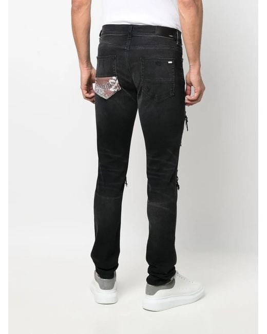 Amiri Blue Ripped Slim-Fit Jeans for men