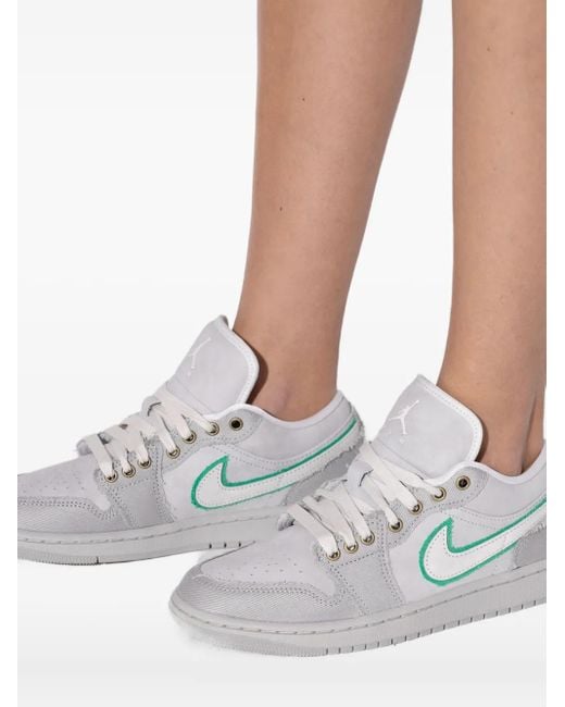 Nike White Air Jordan 1 Low Sneakers