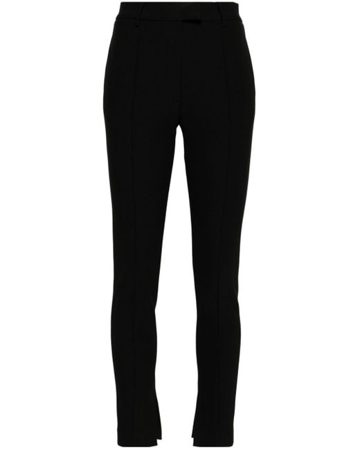 Pantalones slim de talle medio Magda Butrym de color Black