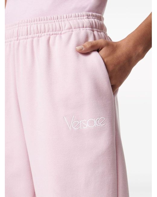 Pantalon de jogging 1980 Re-Edition à broderies Versace en coloris Pink